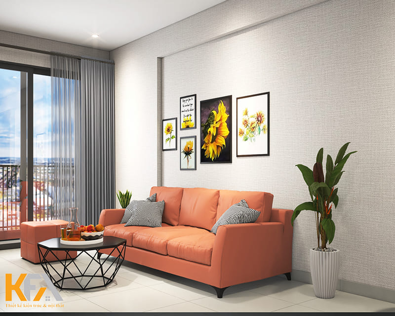 Bộ sofa màu hồng cam là điểm nhấn của phòng khách