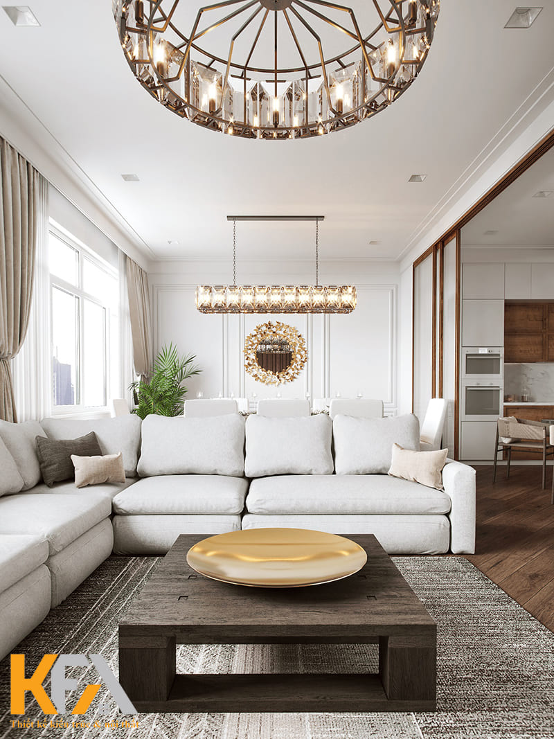 Phòng khách gây ấn tượng với bộ sofa trắng và chiếc đèn trần lớn
