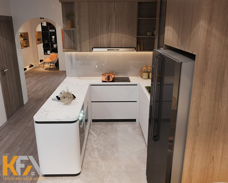 Căn bếp không bố trí ánh sáng quá chói chang mà tập trung tạo cảm giác ấm áp, thoải mái