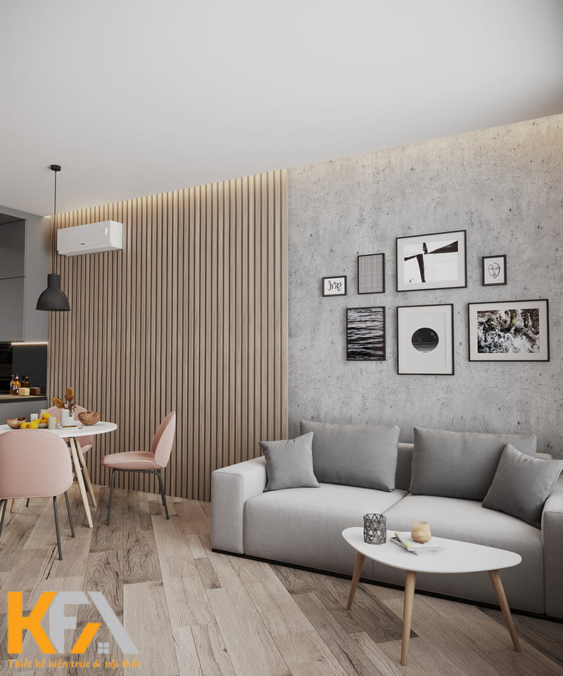 Phòng khách được thiết kế đơn giản với chiếc sofa băng dài và bàn trà nhỏ gọn