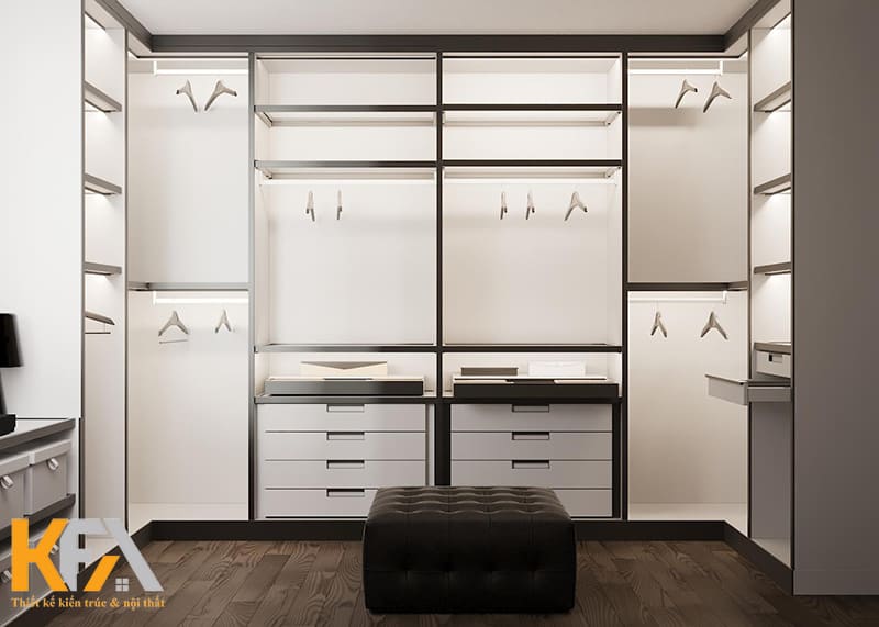 Phòng thay đồ với tủ quần áo kịch trần nhiều ngăn và chiếc sofa đơn êm ái