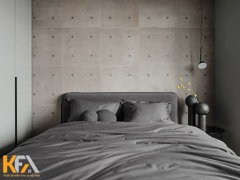 Phòng ngủ được thiết kế đơn giản với gam màu tối chủ đạo