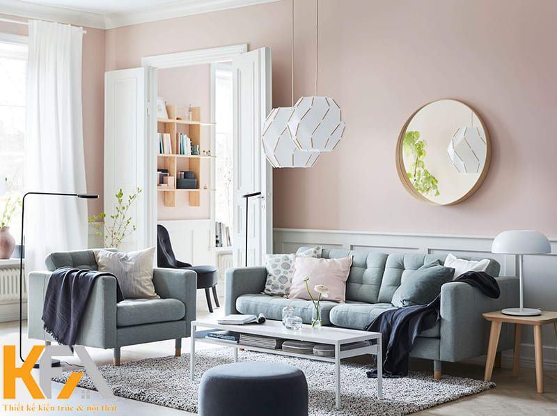 Đặt một chiếc gương tròn trong phòng khách là cách trang trí với thiết kế này