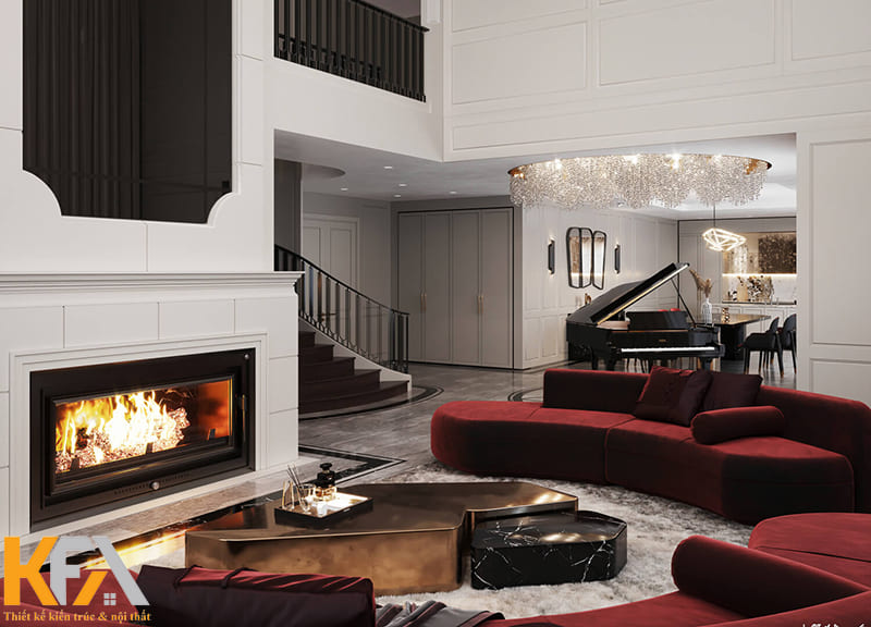 Không gian sang trọng khiến mọi trái tim xao xuyến nhờ chiếc sofa đỏ nổi bật và chiếc bàn trà ánh kim