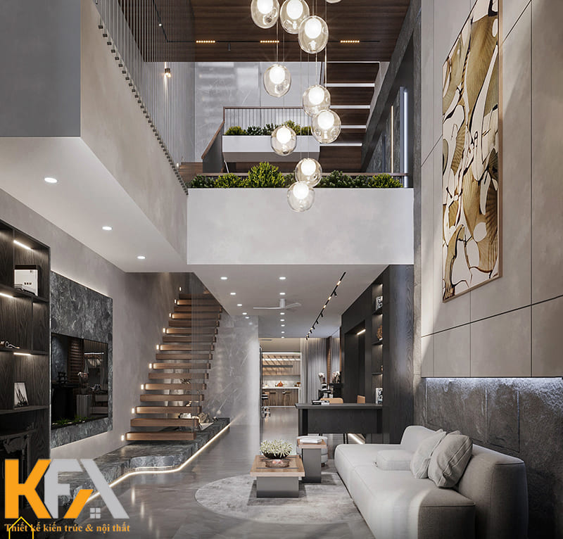 Trang trí phòng khách bằng tranh treo tường lớn và đèn thả